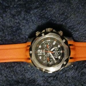 Silicone band invicta watch. Flame and scratch proof 50 M water resistant.